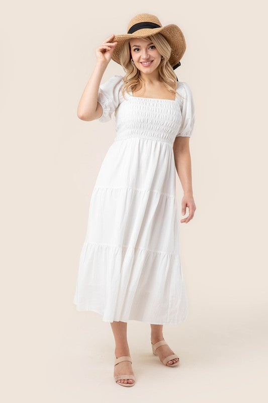 Tiered long dress with puff sleeves